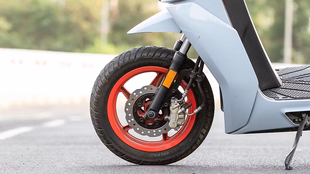 A close-up of the front wheel suspension assembly